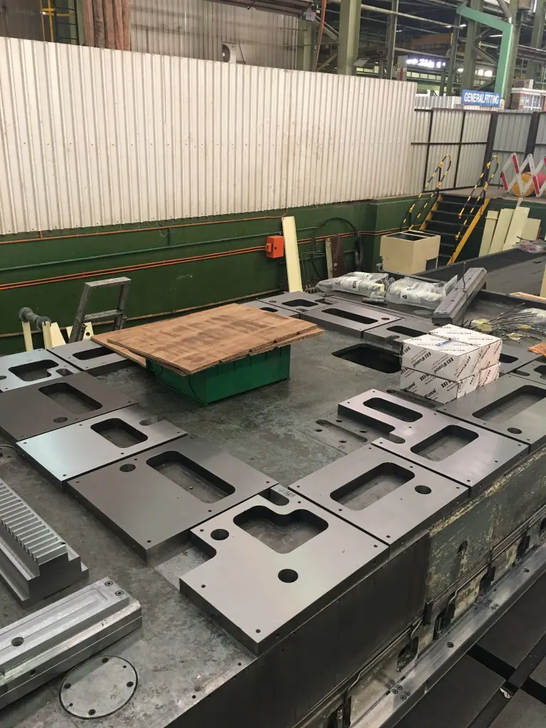 Prepared machine bed and foundation plates during installation