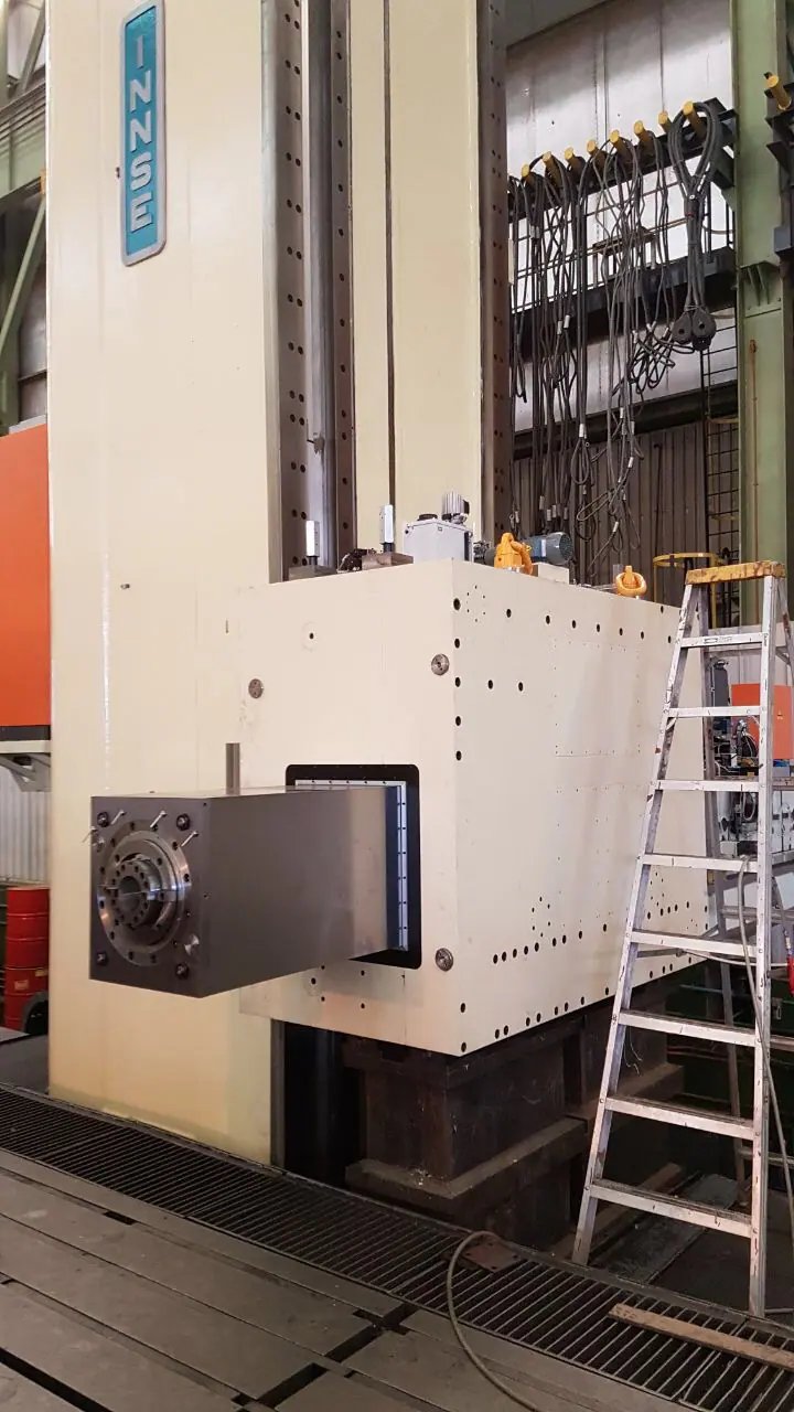 Large Innse machine column and head positioned during installation