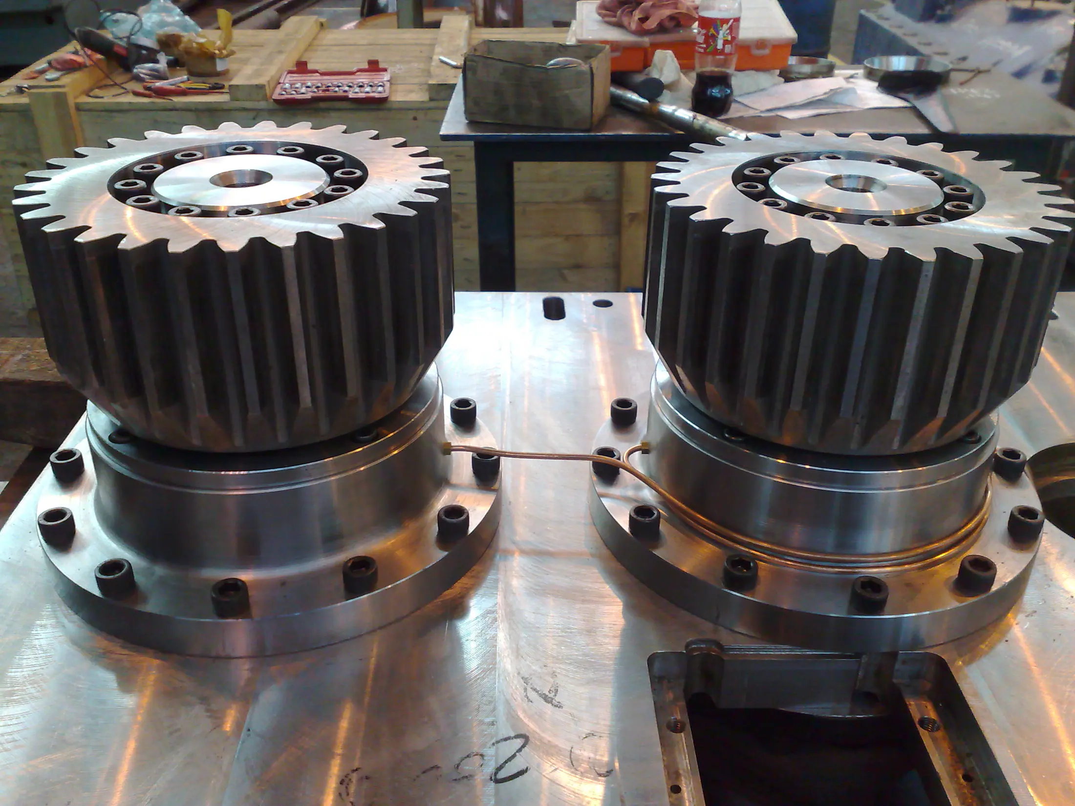 Precision gear assemblies arranged for mechanical work